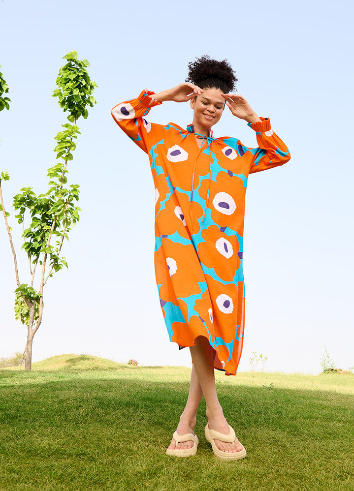 A Model Wearing Multicolor Linen Cotton Orange Mekko Daisy Dress, curated by Only Ethikal