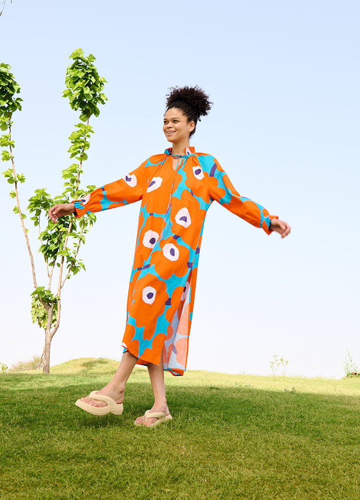 A Model Wearing Multicolor Linen Cotton Orange Mekko Daisy Dress, curated by Only Ethikal