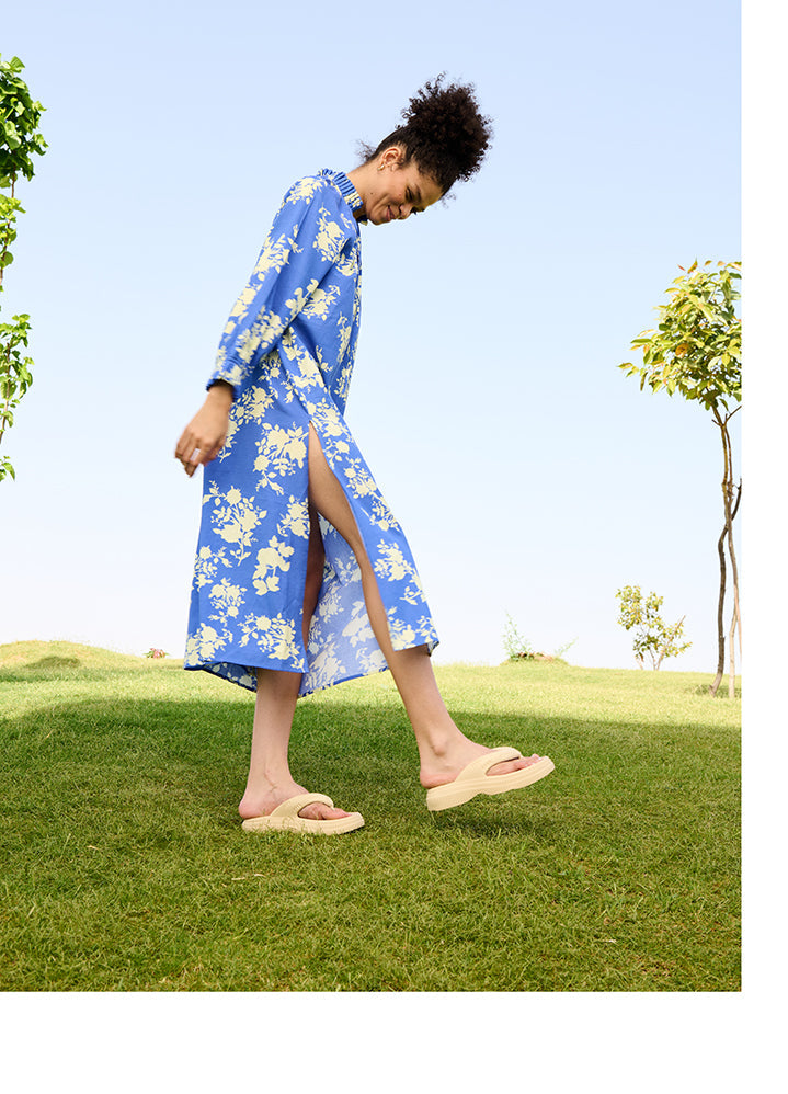 A Model Wearing Multicolor Linen Cotton Floral Skydaisy Dress, curated by Only Ethikal