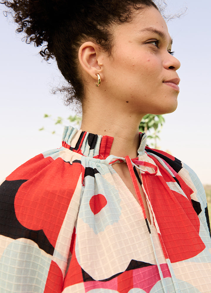 A Model Wearing Multicolor Linen Cotton Pixel Mekko (Sky & Red)Daisy Dress, curated by Only Ethikal