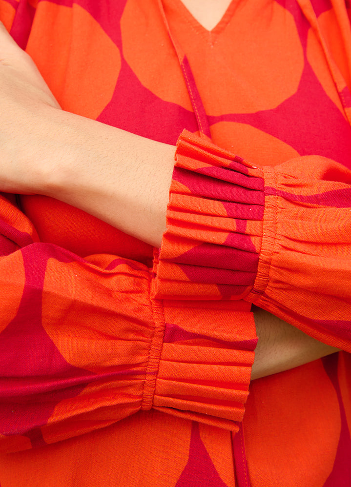 A Model Wearing Multicolor Linen Cotton Polka Red Daisy Dress, curated by Only Ethikal