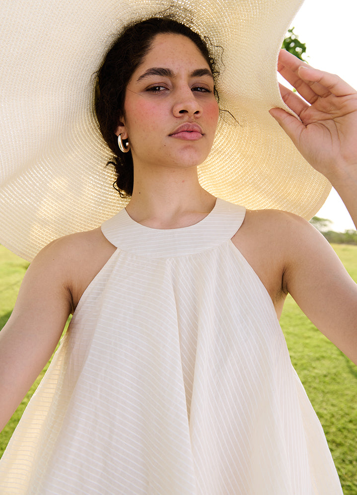 A Model Wearing White 100% Cotton Self Stripescamellia, curated by Only Ethikal