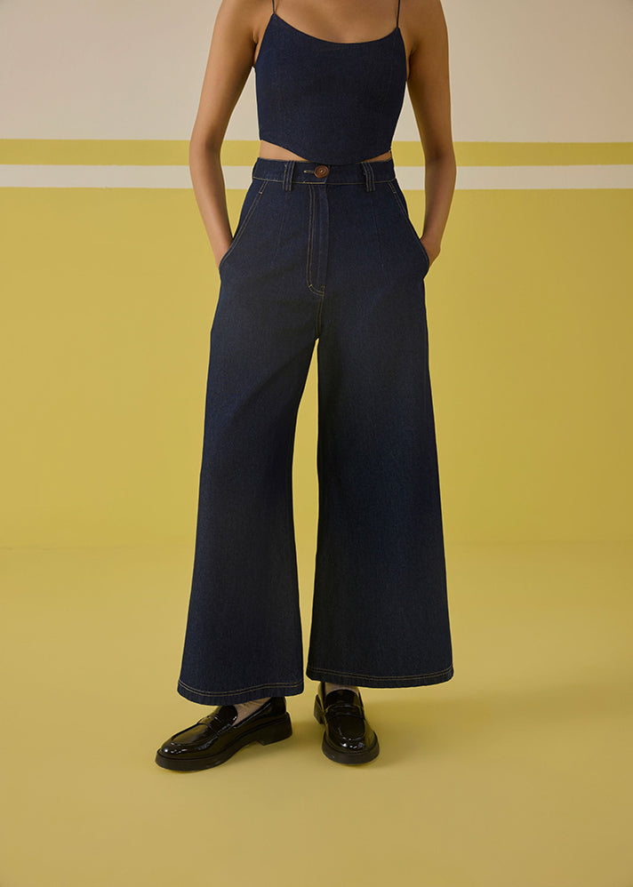 A Model Wearing  Organic Cotton Denim The Daisy Denim Trousers, curated by Only Ethikal