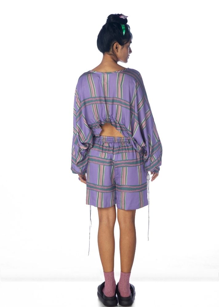 A Model Wearing Purple Lyocell Chaarpai Shorts, curated by Only Ethikal