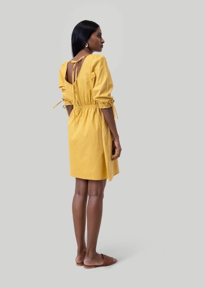 A Model Wearing Yellow Hemp Gathered Elbow Sleeve Short Dress Yellow, curated by Only Ethikal