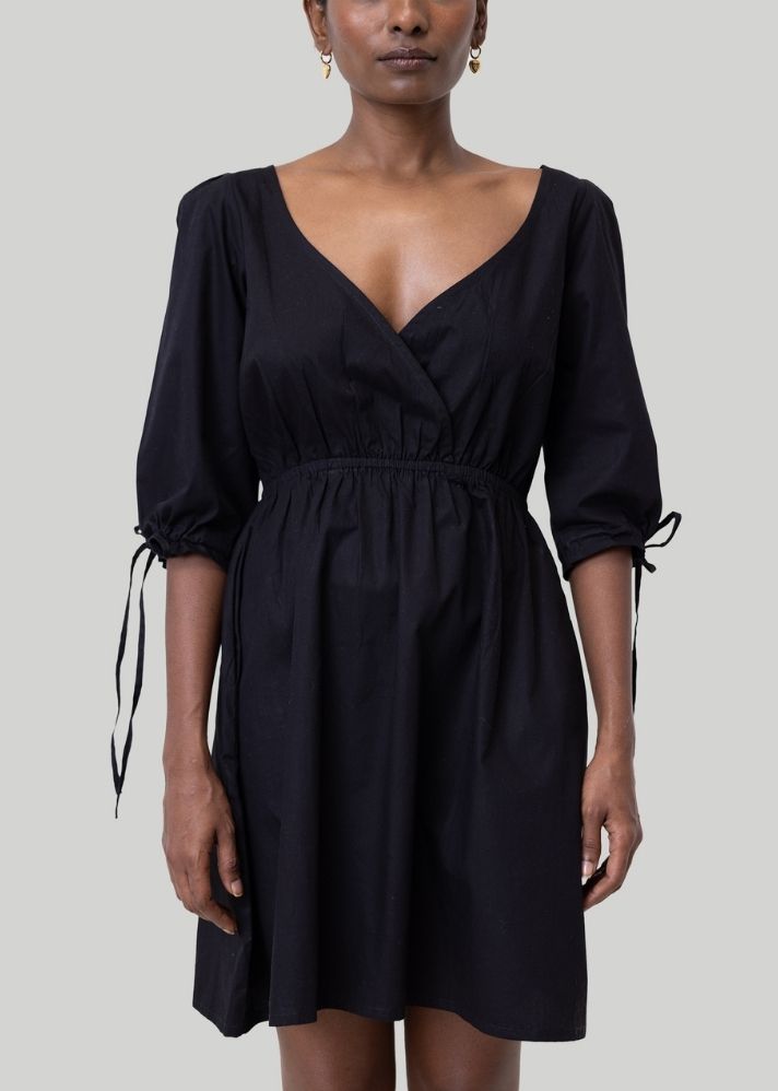 A Model Wearing Black Pure Cotton Gathered Elbow Sleeve Short Dress Black, curated by Only Ethikal