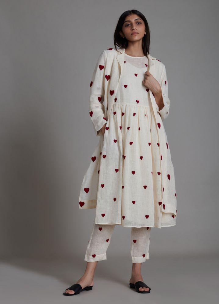A Model Wearing White Linen Teen Patti Cover Set - Oatmeal, curated by Only Ethikal