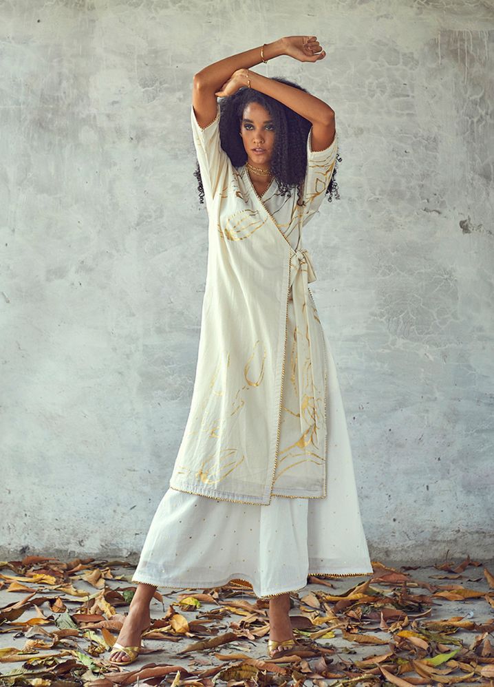 A Model Wearing White Pure Cotton Rajnigandha Kurta (Set Of 2), curated by Only Ethikal