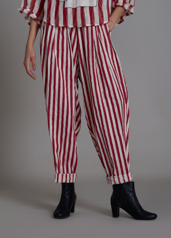 A Model Wearing Stripped Multicolor Handwoven Cotton Ikka Balloon Pants - Red Stripe, curated by Only Ethikal