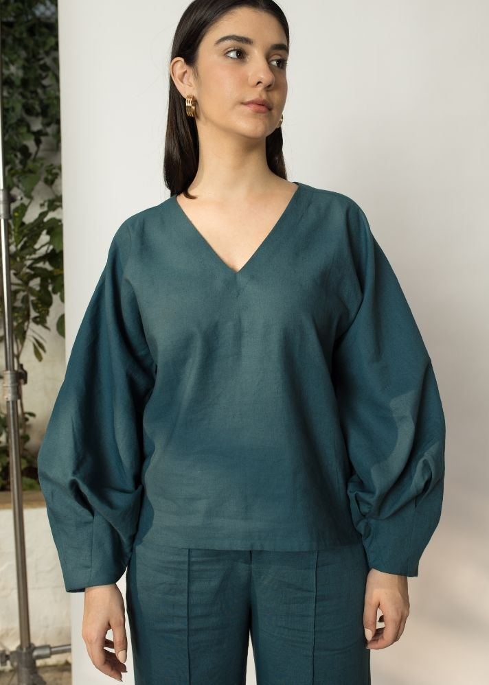 A Model Wearing Green Hemp Dramatic Sleeve Blouse, curated by Only Ethikal