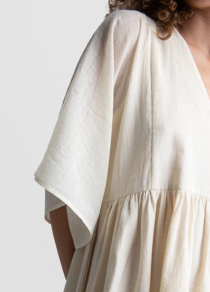 A Model Wearing White Handwoven Cotton Boxy sleeve dress, curated by Only Ethikal