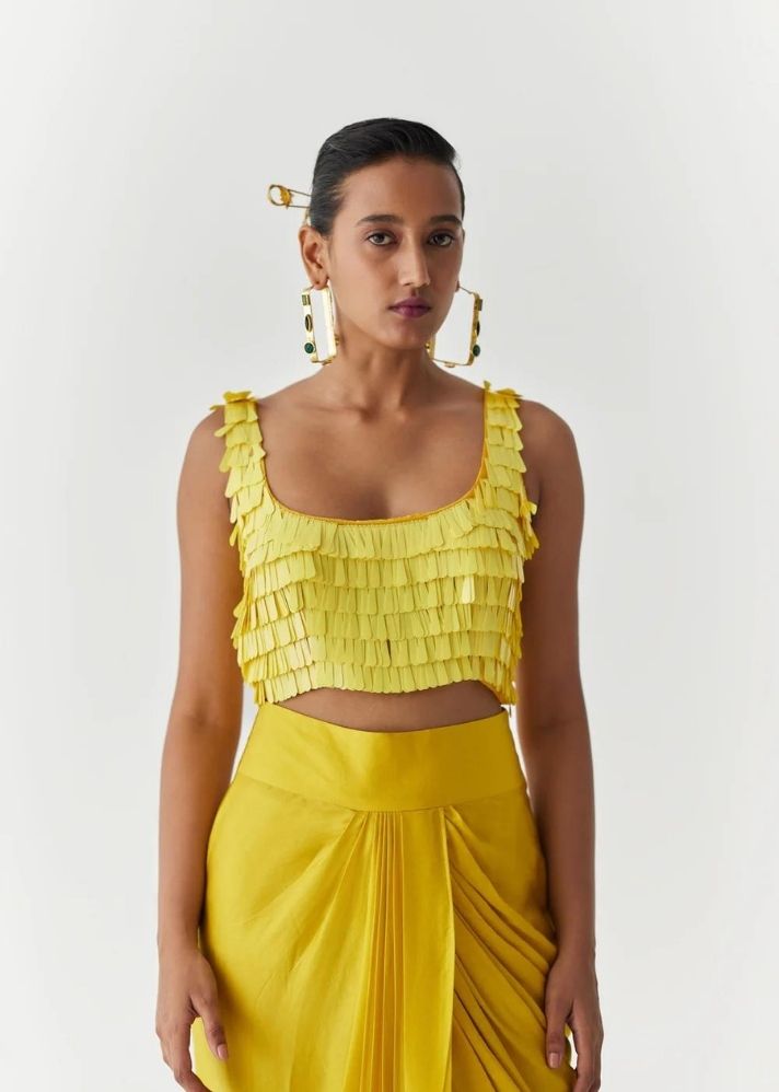 A Model Wearing Yellow Organic Cupro Canary Sequin Blouse & Knot Skirt, curated by Only Ethikal