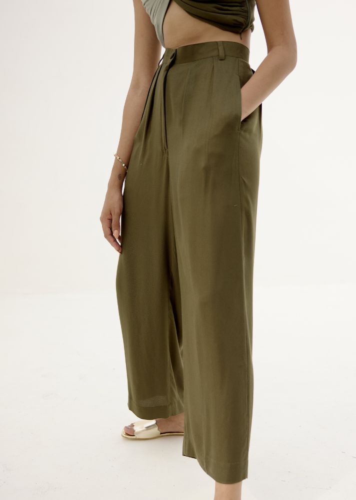A Model Wearing Green Lyocell Green Luna Pleated Pants, curated by Only Ethikal