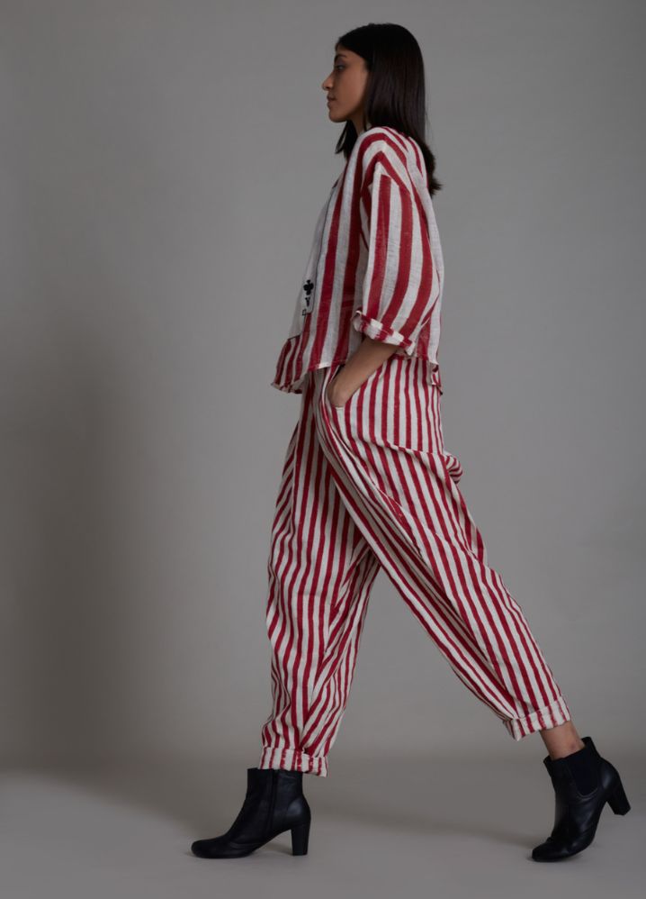 A Model Wearing Stripped Multicolor Handwoven Cotton Ikka Balloon Pants - Red Stripe, curated by Only Ethikal