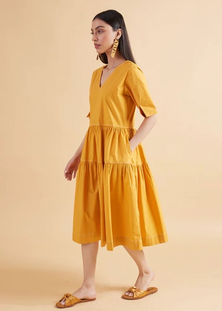 A Model Wearing Yellow Pure Cotton Wonder Amber Solid Dress, curated by Only Ethikal