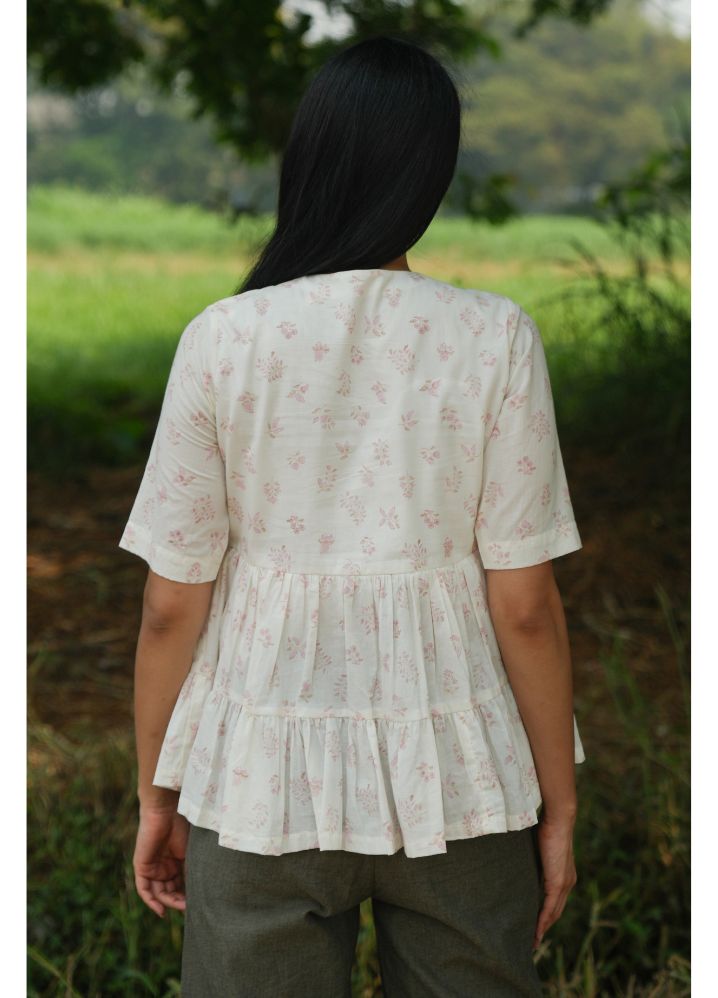 A Model Wearing Block Printed White Pure Cotton Dewdrop Pink Floral Top, curated by Only Ethikal