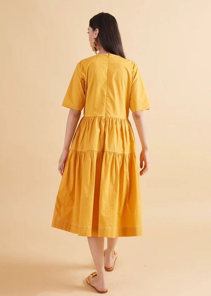 A Model Wearing Yellow Pure Cotton Wonder Amber Solid Dress, curated by Only Ethikal