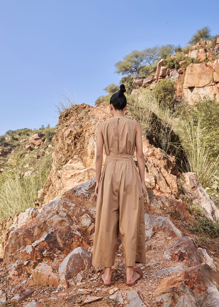 A Model Wearing Brown Pure Cotton In the Woods Jumpsuit, curated by Only Ethikal