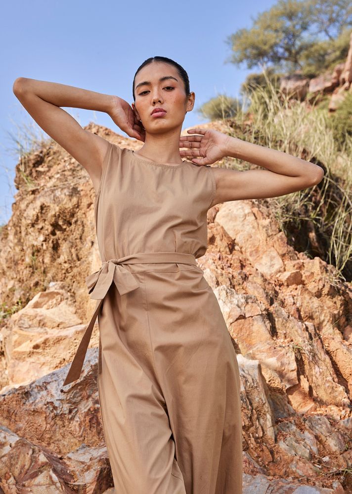 A Model Wearing Brown Pure Cotton In the Woods Jumpsuit, curated by Only Ethikal