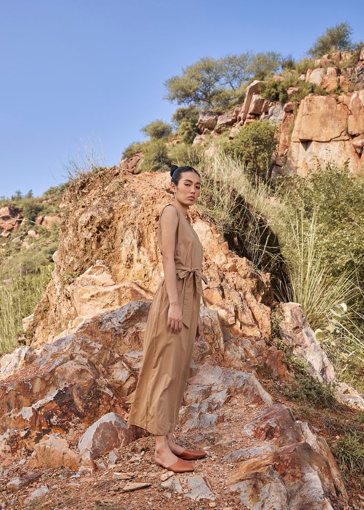 A Model Wearing Brown Pure Cotton In the Woods Jumpsuit, curated by Only Ethikal