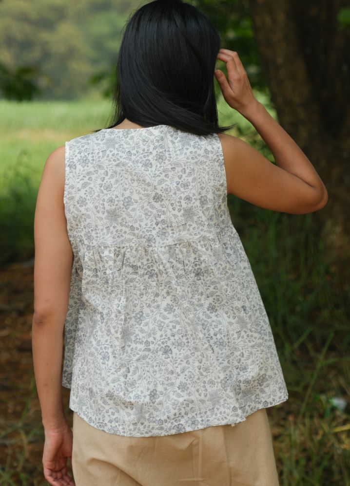 A Model Wearing Block Printed White Pure Cotton Summer Rain Grey Floral Top, curated by Only Ethikal