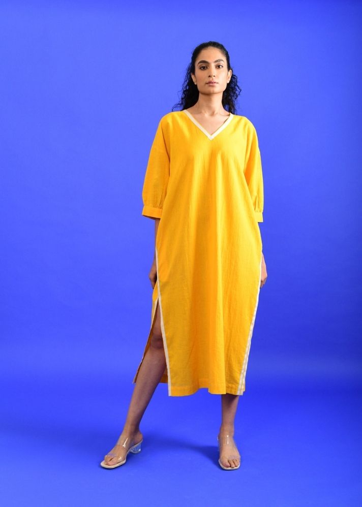A Model Wearing Yellow Handwoven Cotton Iced Mango Dress , curated by Only Ethikal