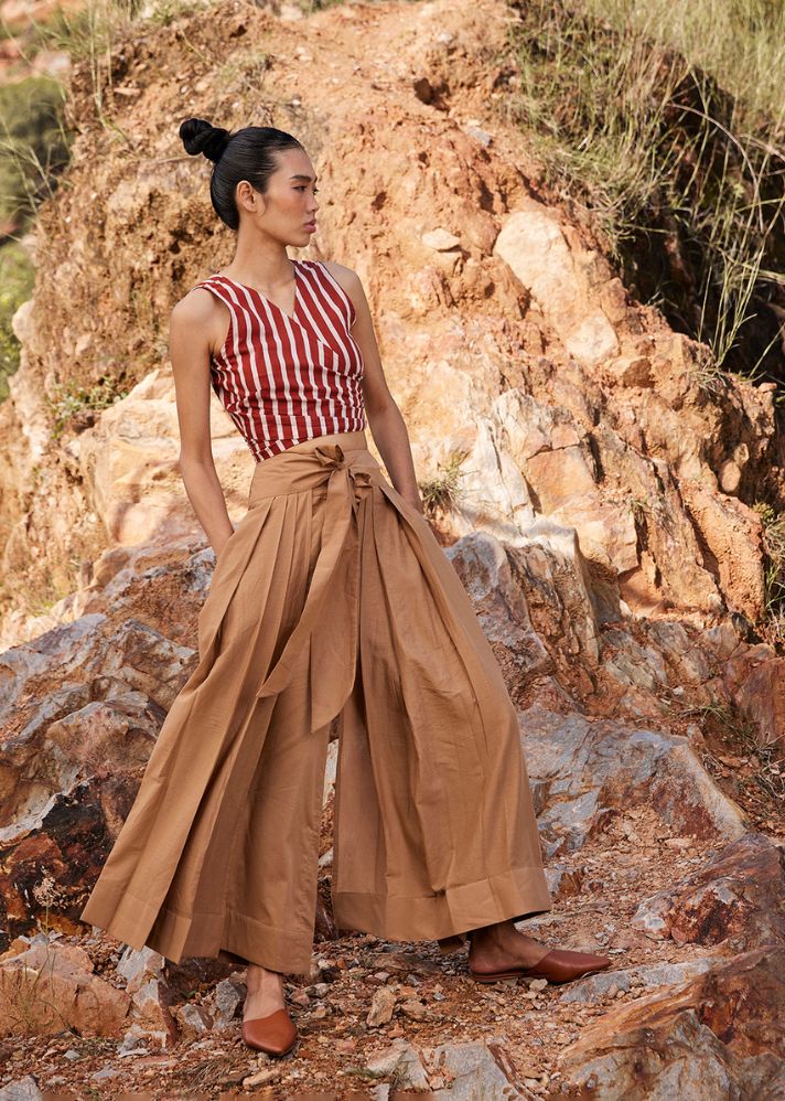 A Model Wearing Brown Pure Cotton Lost In Chase Pleated Trouser, curated by Only Ethikal