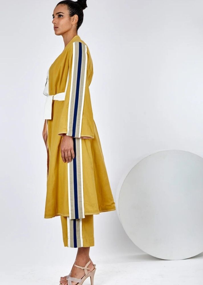 A Model Wearing Yellow Pure Cotton Amaya Ochre/ Mustard Long Jacket, curated by Only Ethikal