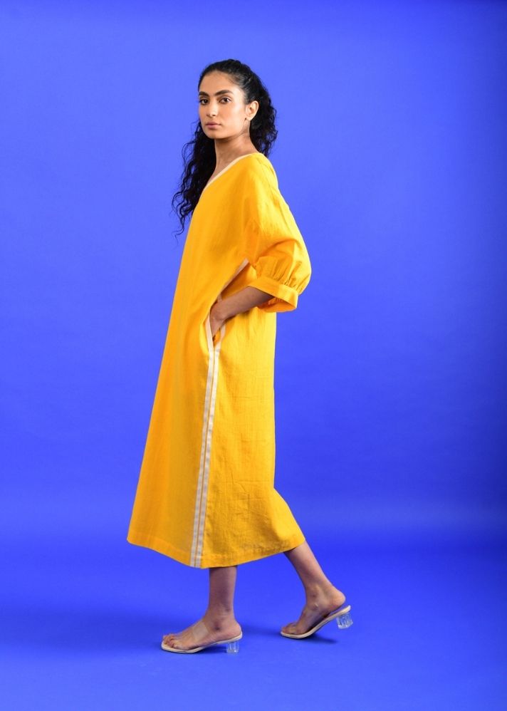 A Model Wearing Yellow Handwoven Cotton Iced Mango Dress , curated by Only Ethikal