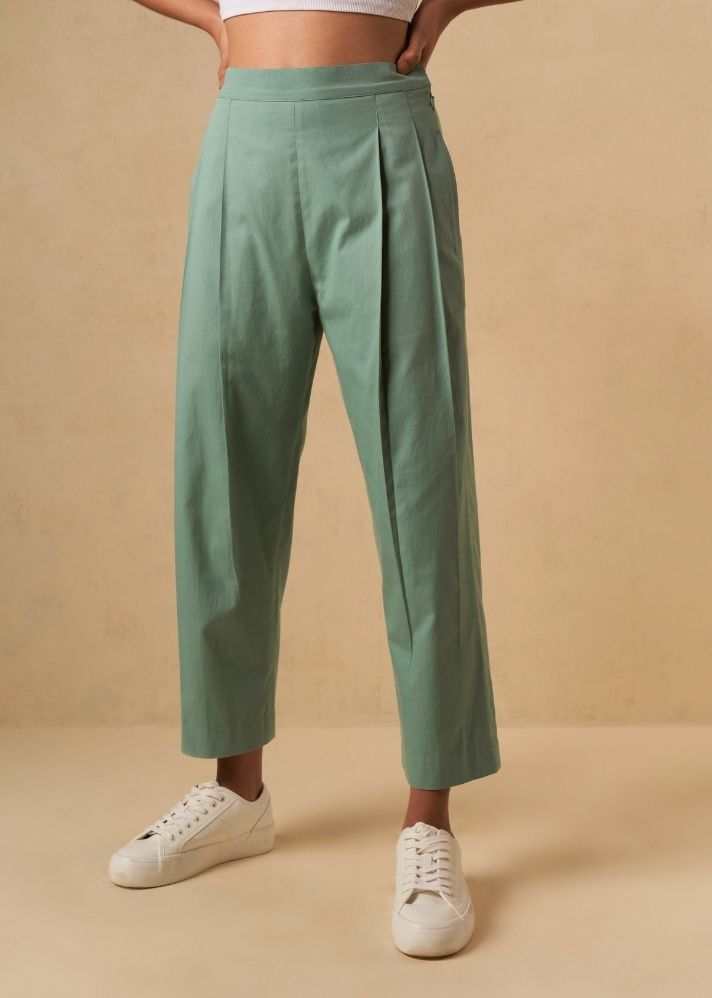 A Model Wearing Green Organic Cotton The Ocean Tide organic cotton trousers, curated by Only Ethikal