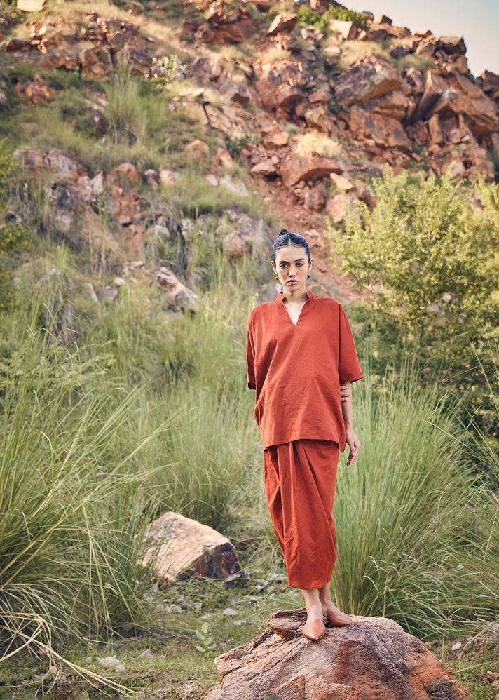 A Model Wearing Red Pure Cotton Beyond The Rays Dhoti Skirt Co-ord Set, curated by Only Ethikal