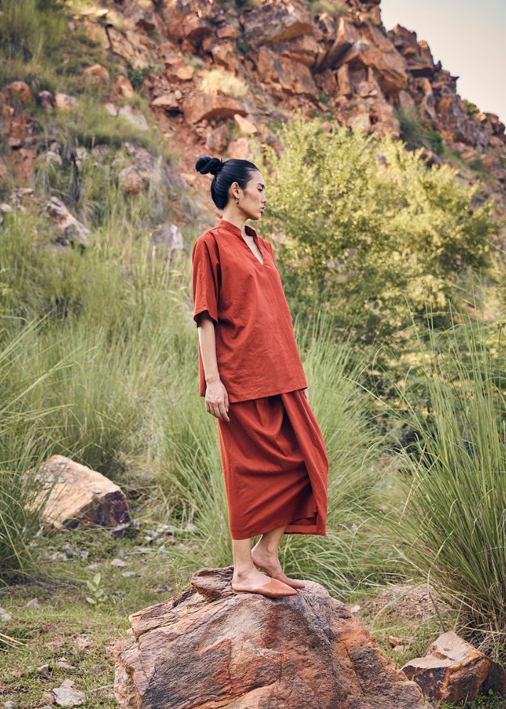 A Model Wearing Red Pure Cotton Beyond The Rays Dhoti Skirt Co-ord Set, curated by Only Ethikal