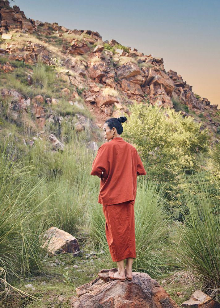 A Model Wearing Red Pure Cotton Beyond The Rays Dhoti Skirt Co-ord Set, curated by Only Ethikal