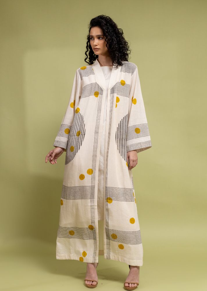 A Model Wearing White Handwoven Cotton Circular Off White Abaya, curated by Only Ethikal
