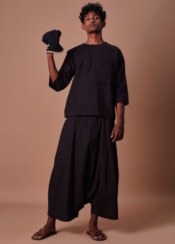 A Model Wearing  Black Pure Cotton Black Cross Pocket Top & Harem Pants Set, curated by Only Ethikal