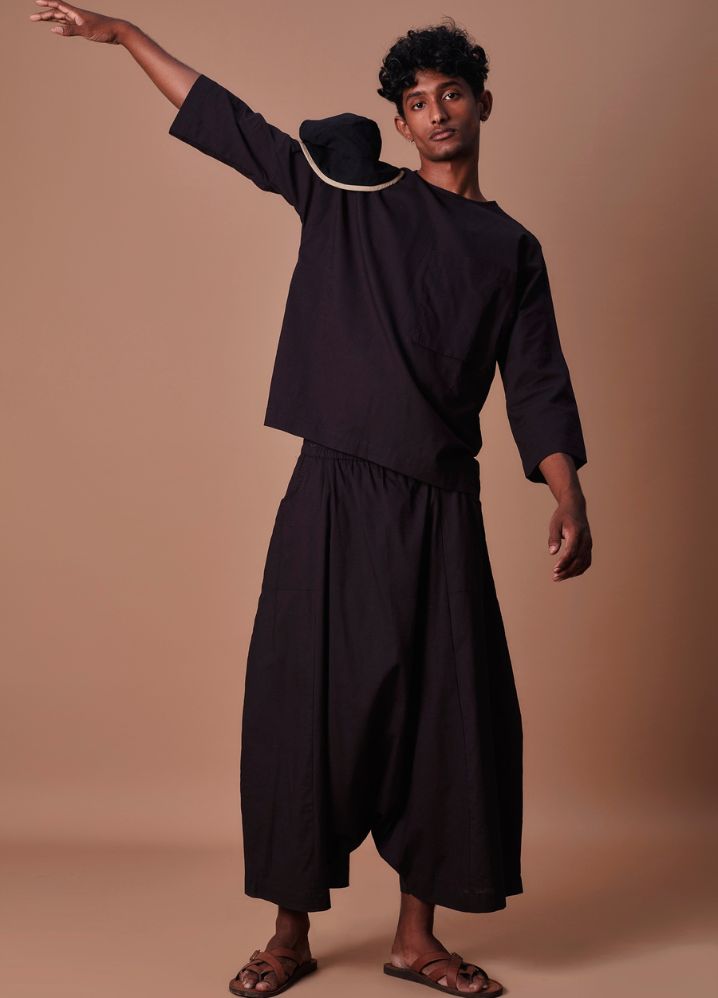A Model Wearing  Black Pure Cotton Black Cross Pocket Top & Harem Pants Set, curated by Only Ethikal