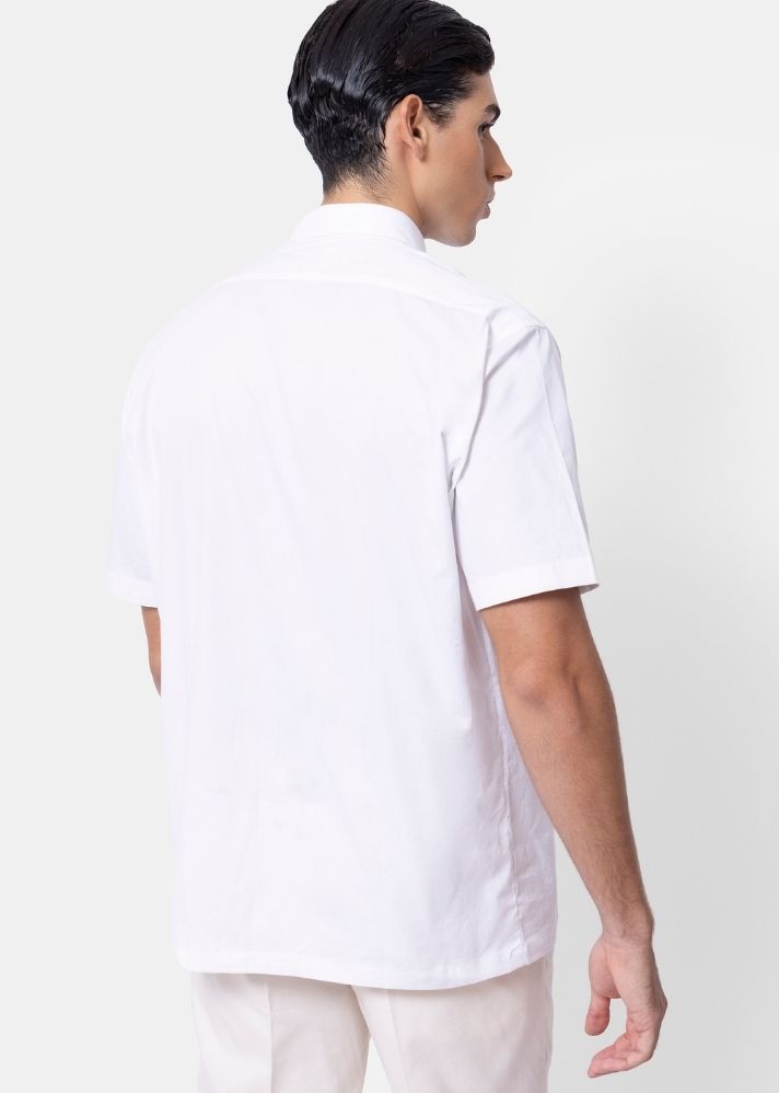 A Model Wearing White Pure Cotton THE EDEN SHIRT, curated by Only Ethikal