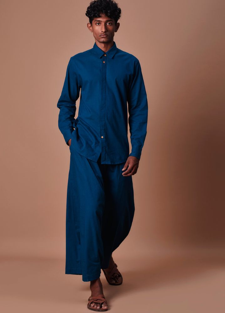 A Model Wearing  Blue Pure Cotton Teal Blue Double Buttoned Shirt And Harem Pant Set, curated by Only Ethikal
