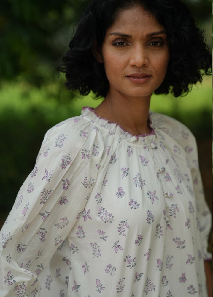 A Model Wearing Block Printed White Pure Cotton Tranquil Trot Purple Floral Top, curated by Only Ethikal