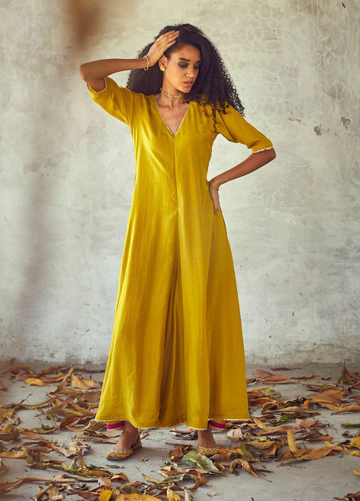 A Model Wearing Yellow Pure Cotton Sunehri Jumpsuit, curated by Only Ethikal