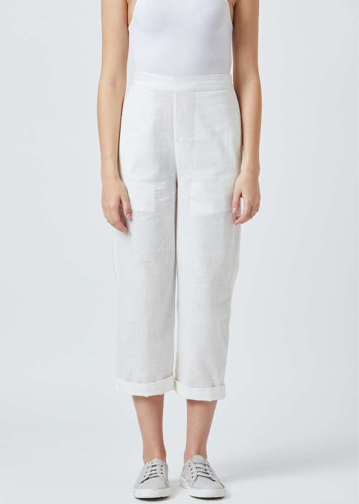 Women wearing pure Cotton Tapered White pants by Doodlage curated by Only ethikal 