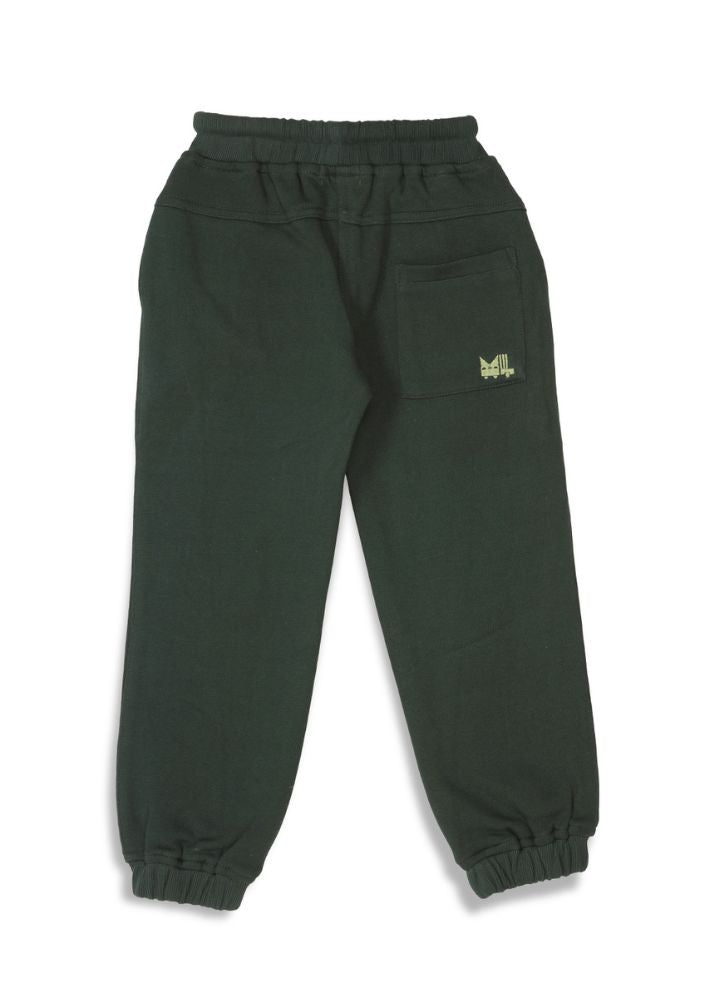 A Model Wearing Green Pure Cotton Planet First Dark Green Unisex Joggers in Cotton Fleece, curated by Only Ethikal