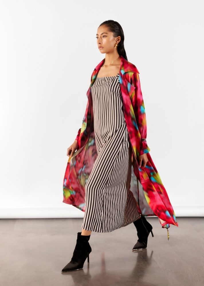 A Model Wearing Multicolor Organic Cupro Poppy Trench Coat With Striped Slip Dress, curated by Only Ethikal