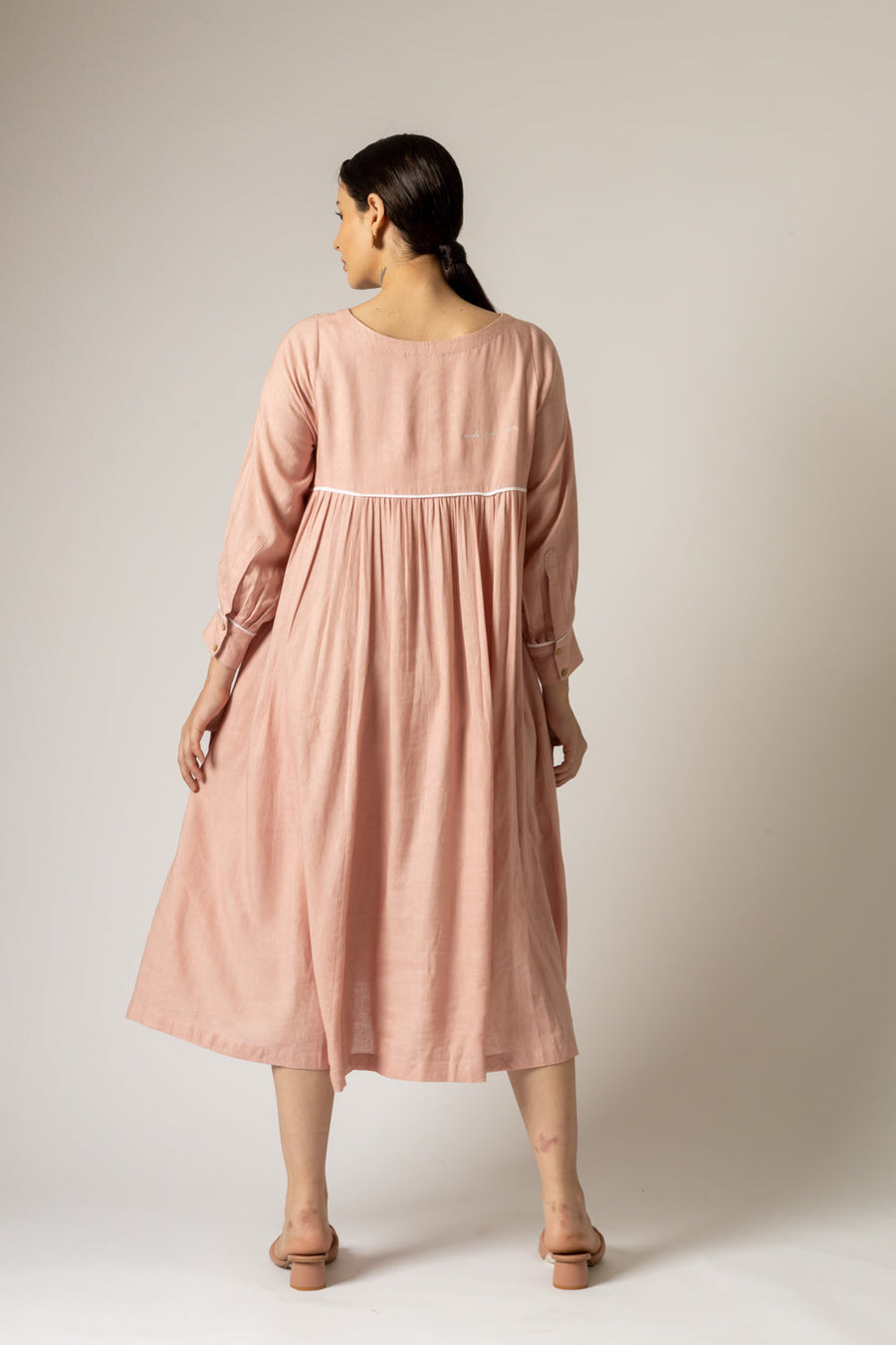 A Model Wearing Pink Linen Yayoi Pink Dress, curated by Only Ethikal