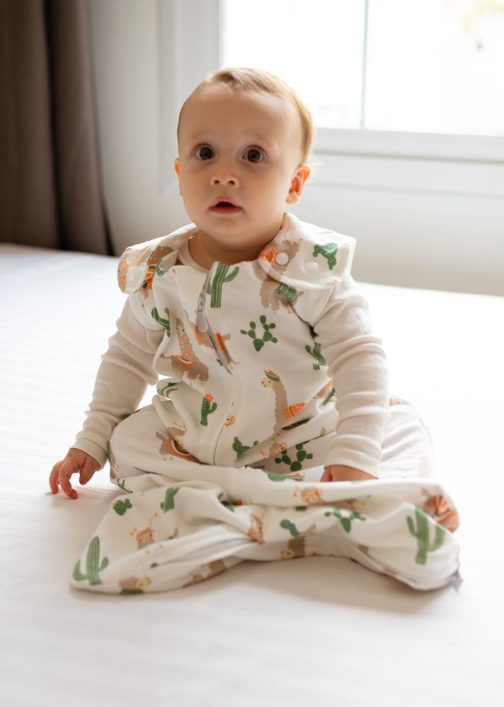 A Model Wearing Multicolor Organic Cotton Tickle Tickle Organic Cotton Sleeping Bag- 1.0 TOG- Sleep Tight Llama, curated by Only Ethikal