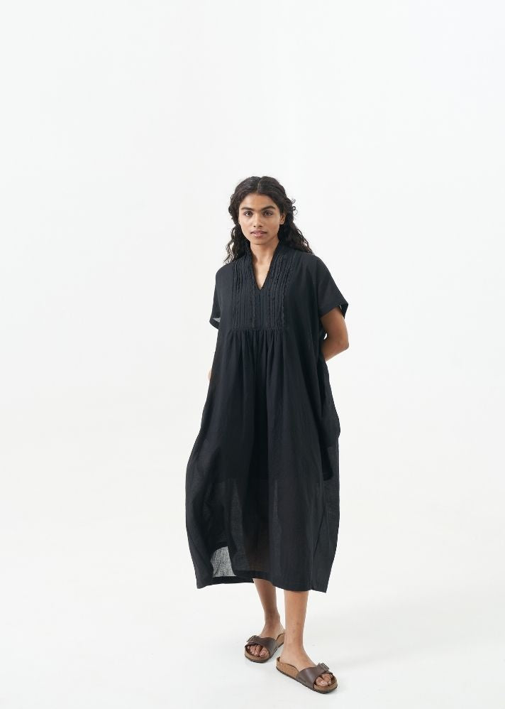 A Model Wearing Black Handwoven Cotton Black caftan dress, curated by Only Ethikal
