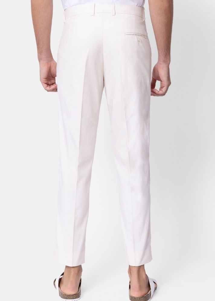 A Model Wearing White Pure Cotton THE EDEN TROUSER, curated by Only Ethikal