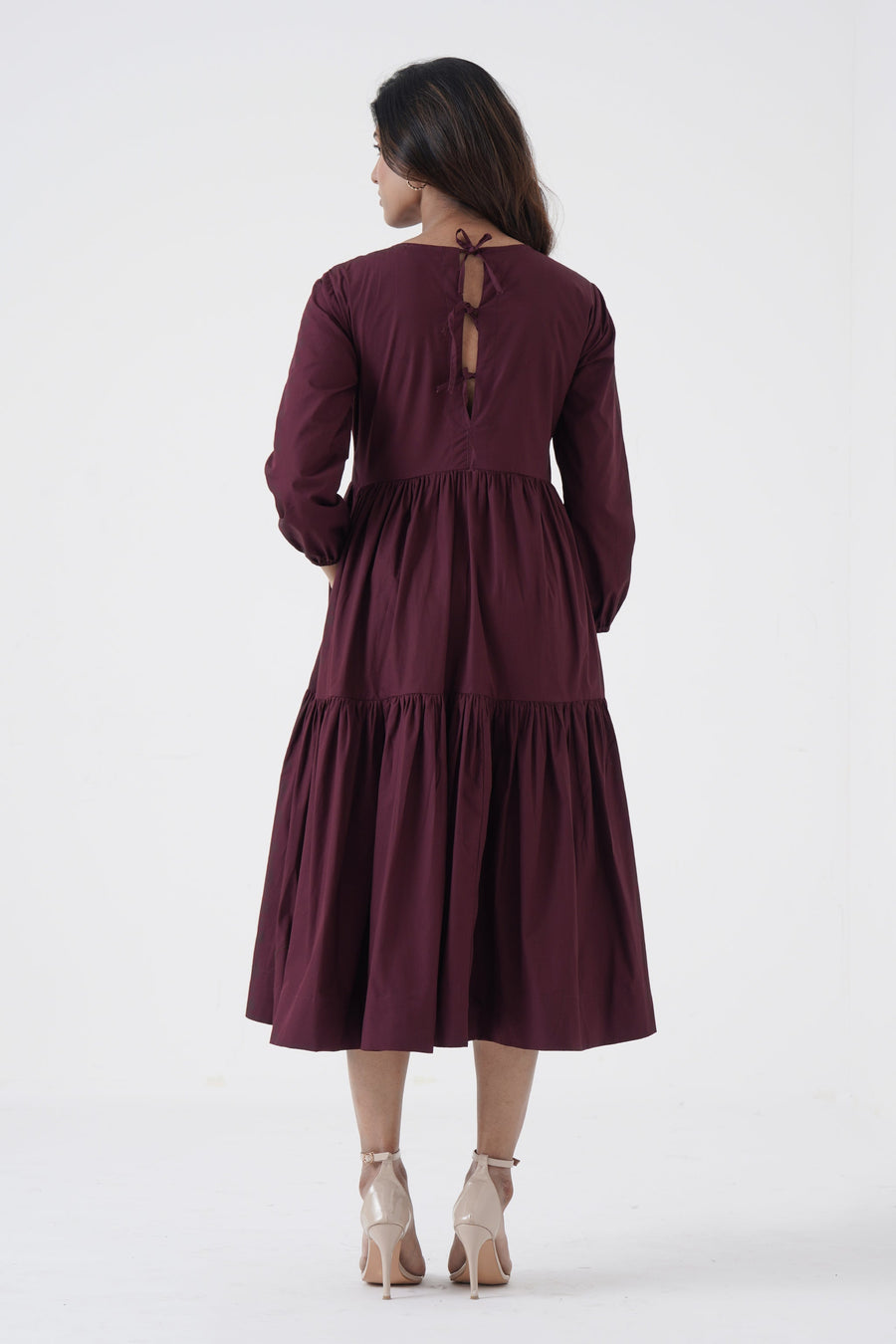 A Model Wearing Brown Pure Cotton Bustling Soul- Back strap Tier Dress- Wine, curated by Only Ethikal
