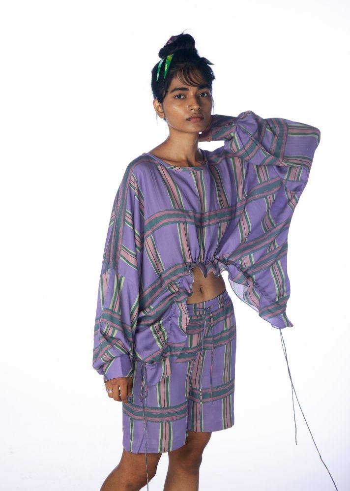 A Model Wearing Purple Lyocell Chaarpai Jhola Top, curated by Only Ethikal