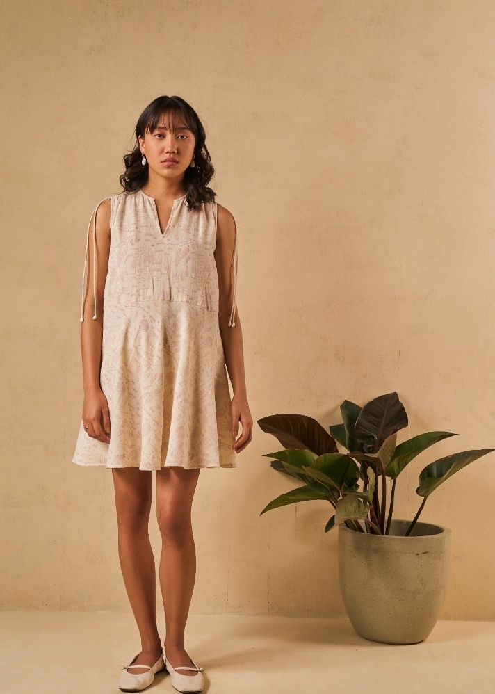 A Model Wearing White Organic Cotton The Coral Tide handwoven dress, curated by Only Ethikal
